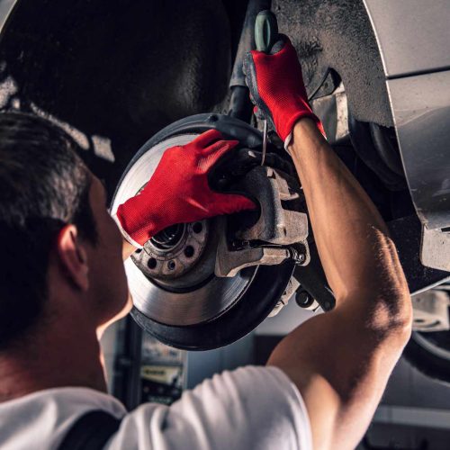 mechanic-repairing-the-bearing-HRCBLFB-1.jpg